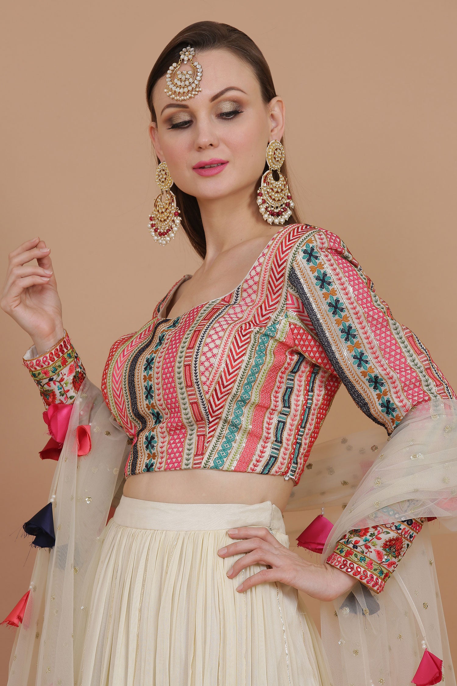 Ivory Stunning Lehenga With Multicolor Fringed Dupatta