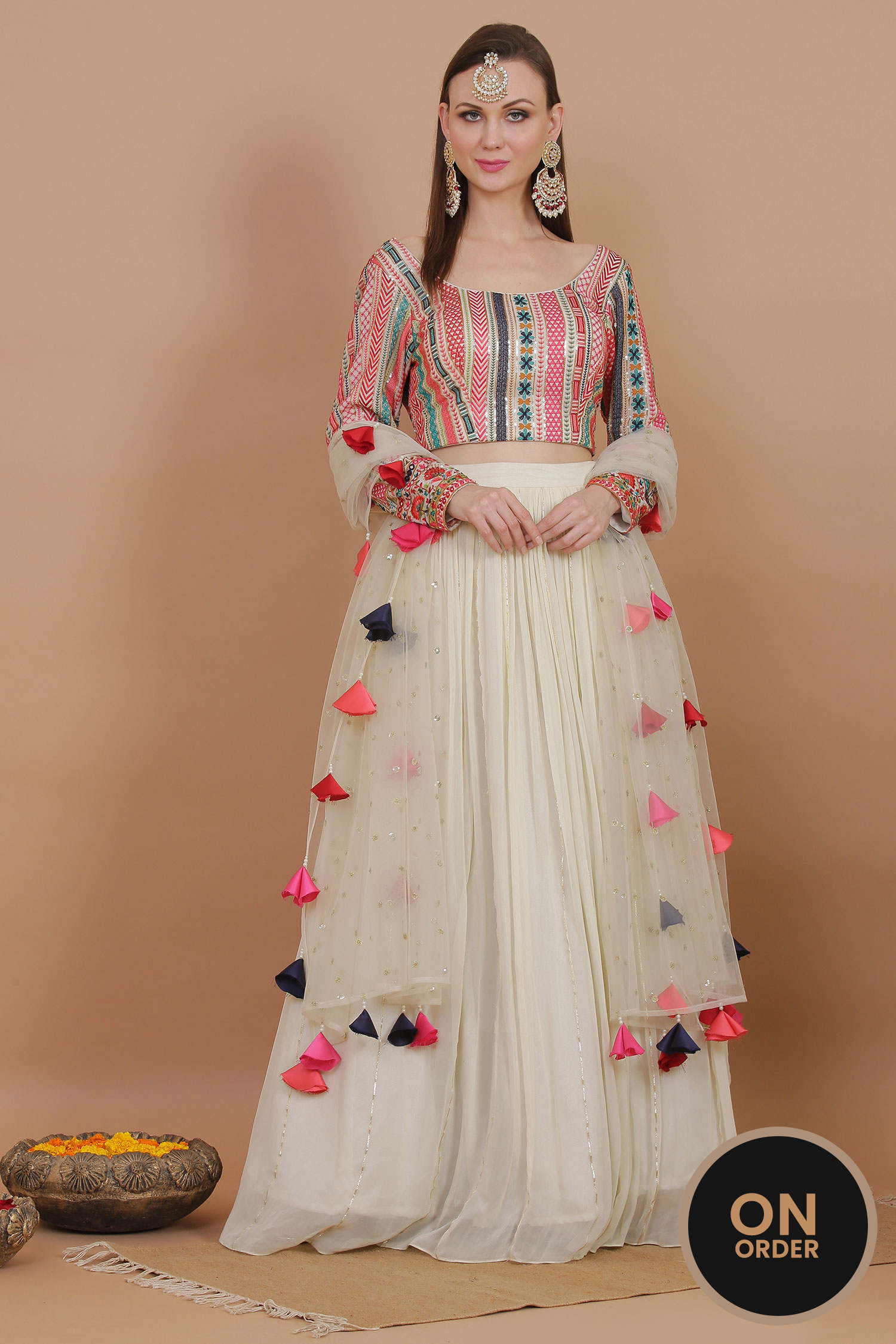 Ivory Stunning Lehenga With Multicolor Fringed Dupatta